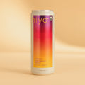 Niyo brand organic blackberry lemon social tonic in a 12 fl oz aluminum can with gradient purple to yellow label on beige bac