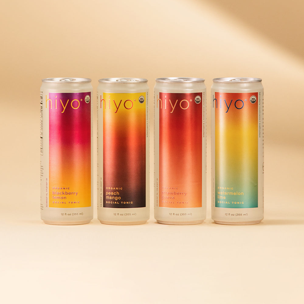 Four 12 fl oz cans of organic social tonic in blackberry acai, peach mango, strawberry guava, and watermelon lime flavors.