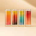 Four 12 fl oz cans of Hiyo organic social tonic in passion fruit tangerine, peach mango, pineapple coconut, and strawberry gu