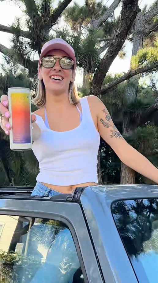 a woman prepares for a beach outing by loading hiyo social tonics into a cooler and meeting friends. the video follows the group driving to the beach, setting up by the water, enjoying hiyo together, and spending time relaxing, talking, and soaking up the sun.
